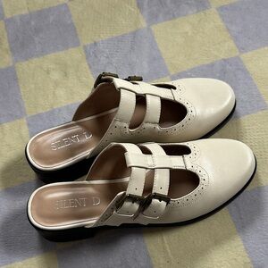 Never Worn cream mules